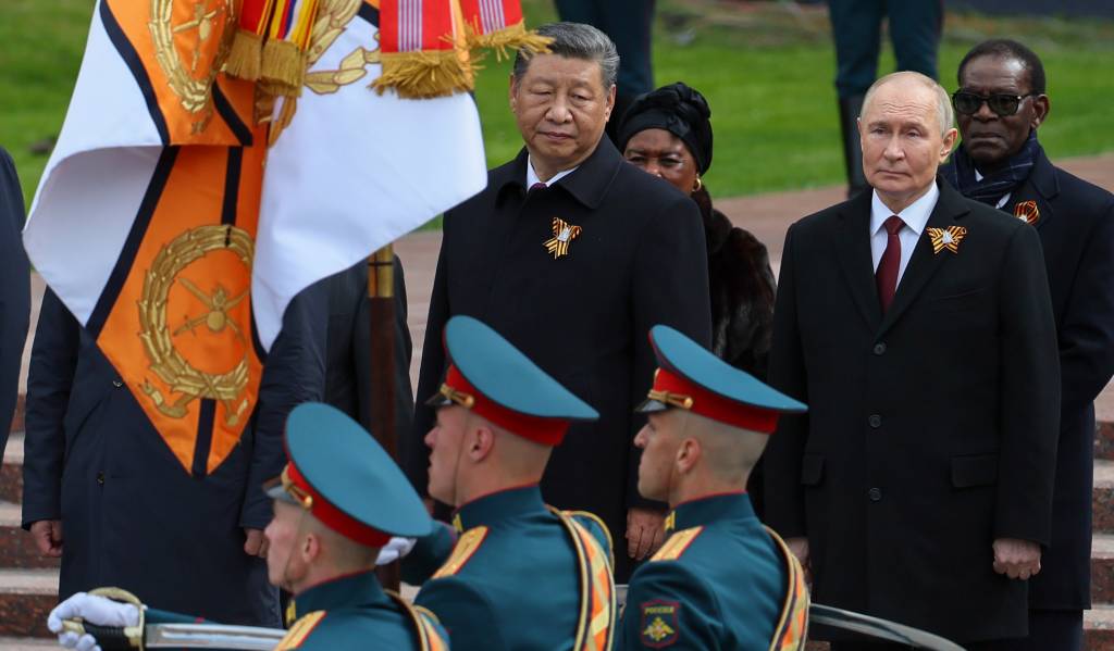 Chinese President Xi Jinping, centre, and Russian President Vladimir Putin, second from right, attend a wreath laying ceremony at the Tomb of the Unknown Soldier in Alexander Garden after the Victory Day military parade in Moscow, Russia, Friday, May 9, 2025, during celebrations of the 80th anniversary of the Soviet Union's victory over Nazi Germany during the World War II. (Yuri Kochetkov/Pool Photo via AP, File)