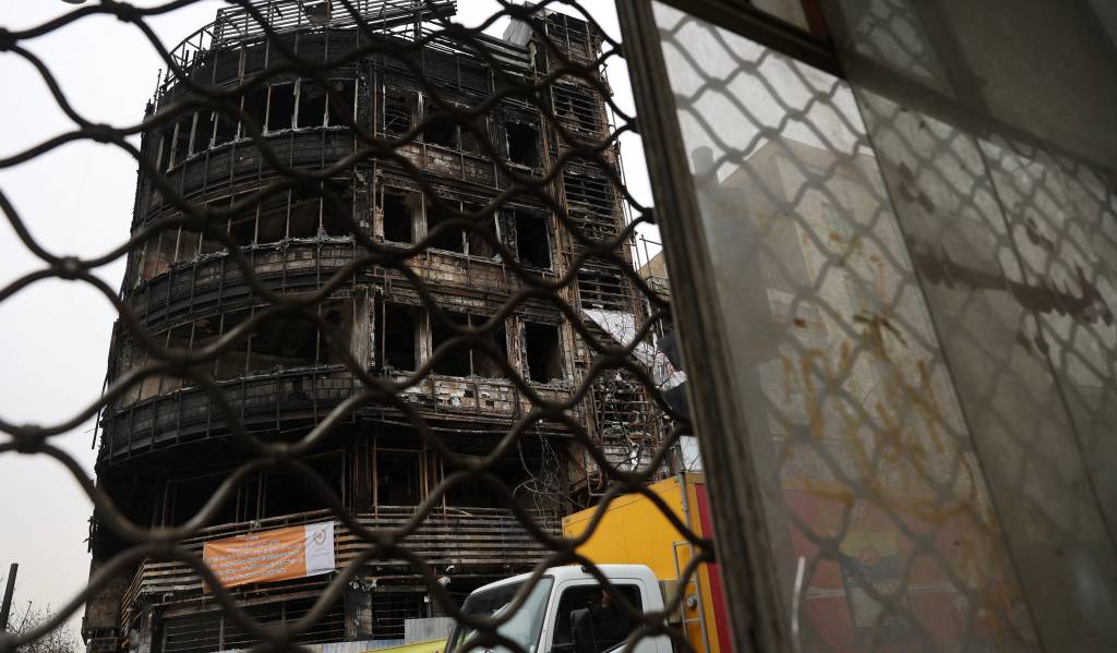 The state bank building burned during Iran's protests, on a street in Tehran, Iran, January 19, 2026. Majid Asgaripour/WANA (West Asia News Agency) via REUTERS ATTENTION EDITORS - THIS PICTURE WAS PROVIDED BY A THIRD PARTY
