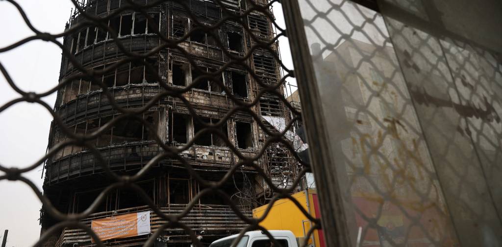 The state bank building burned during Iran's protests, on a street in Tehran, Iran, January 19, 2026. Majid Asgaripour/WANA (West Asia News Agency) via REUTERS ATTENTION EDITORS - THIS PICTURE WAS PROVIDED BY A THIRD PARTY